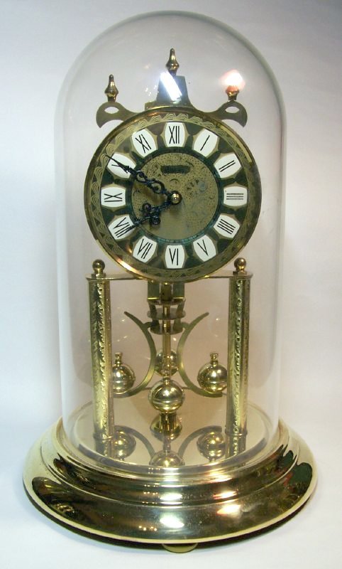 Haller_torsion_pendulum_anniversary_clock.jpg